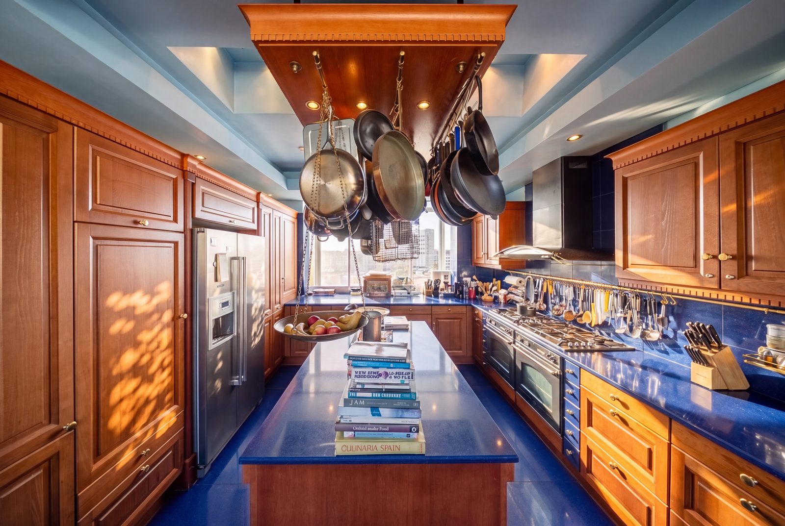 The galley run under the engineered hanging pot racks